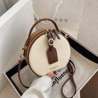 PU Leather Handbag bun & soft surface & attached with hanging strap PC