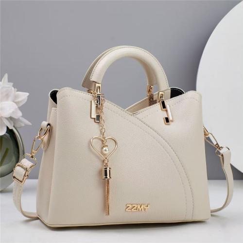 PU Leather hard-surface Handbag with hanging ornament & attached with hanging strap Solid PC