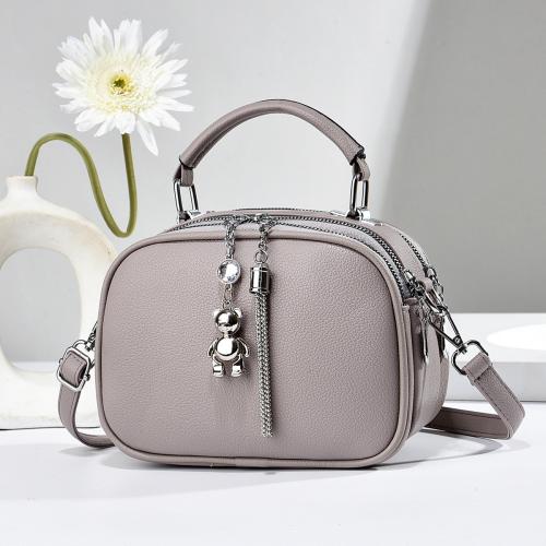 PU Leather hard-surface & Easy Matching Handbag with hanging ornament & attached with hanging strap Solid PC