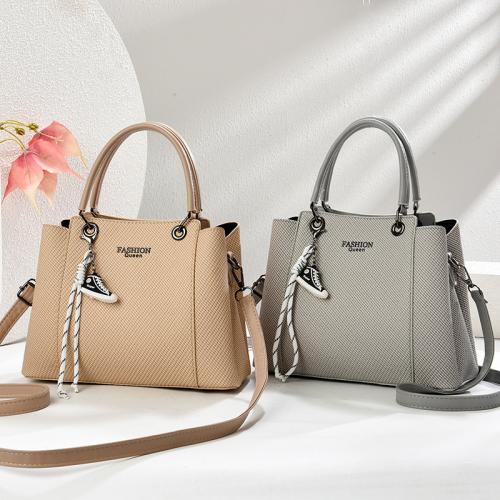 PU Leather Easy Matching Handbag with hanging ornament PC