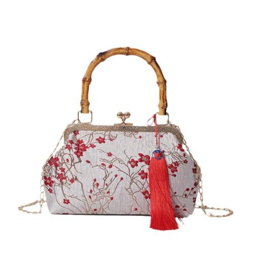 Fashion New Bamboo Handle Design Handbag Tassel Embroidered Bag