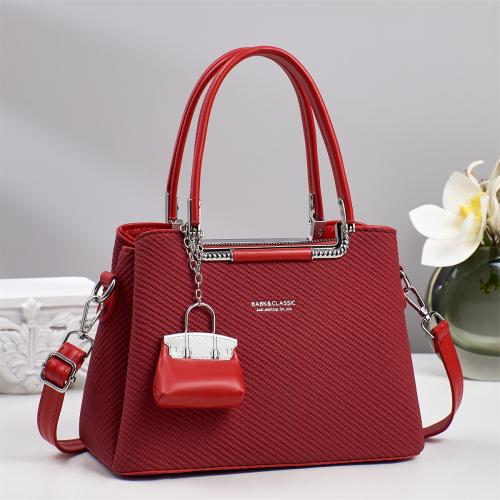 PU Leather Easy Matching Handbag with hanging ornament & attached with hanging strap PC