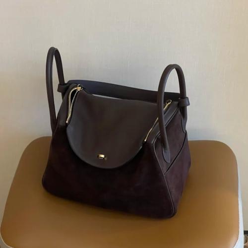 Cowhide Pillow Shaped Handbag & attached with hanging strap Solid PC